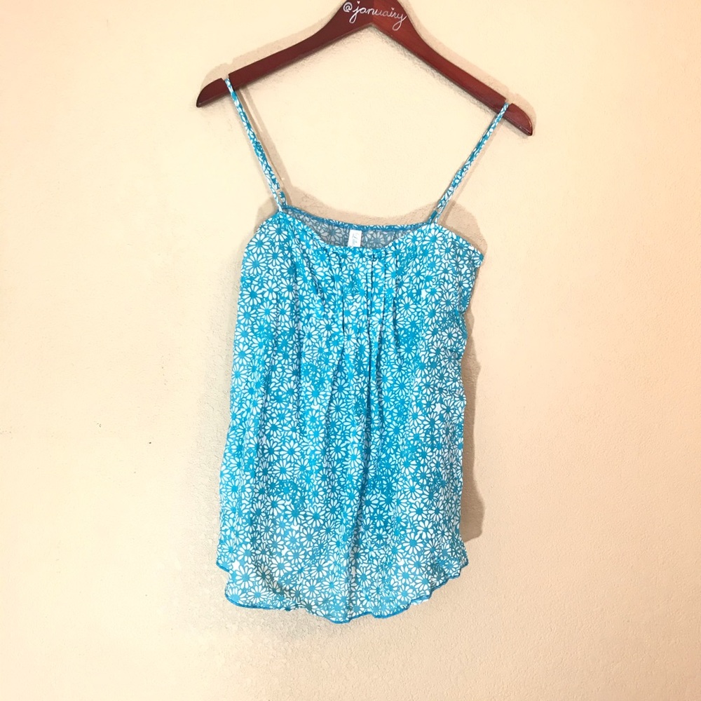 Bright blue and white floral patterned cotton top